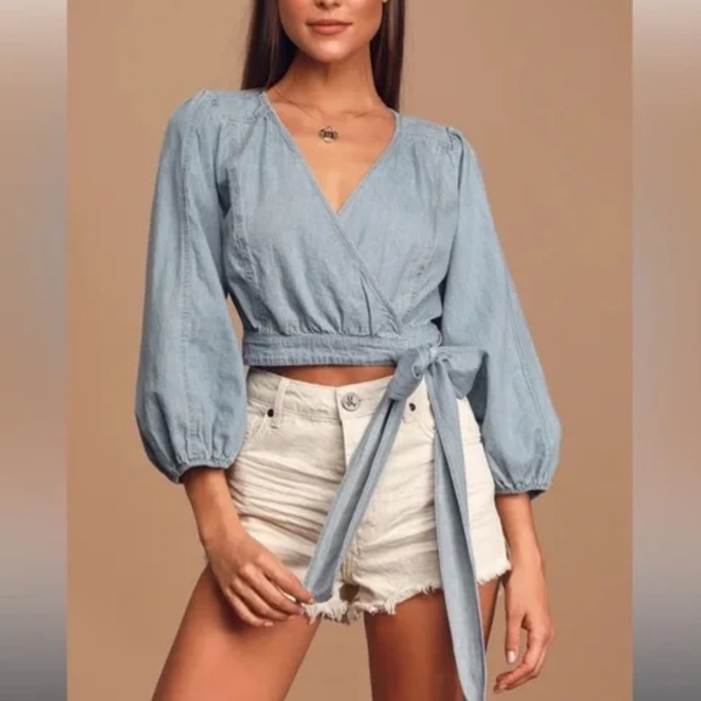 Free people denim top! Never worn before and super flattering :)